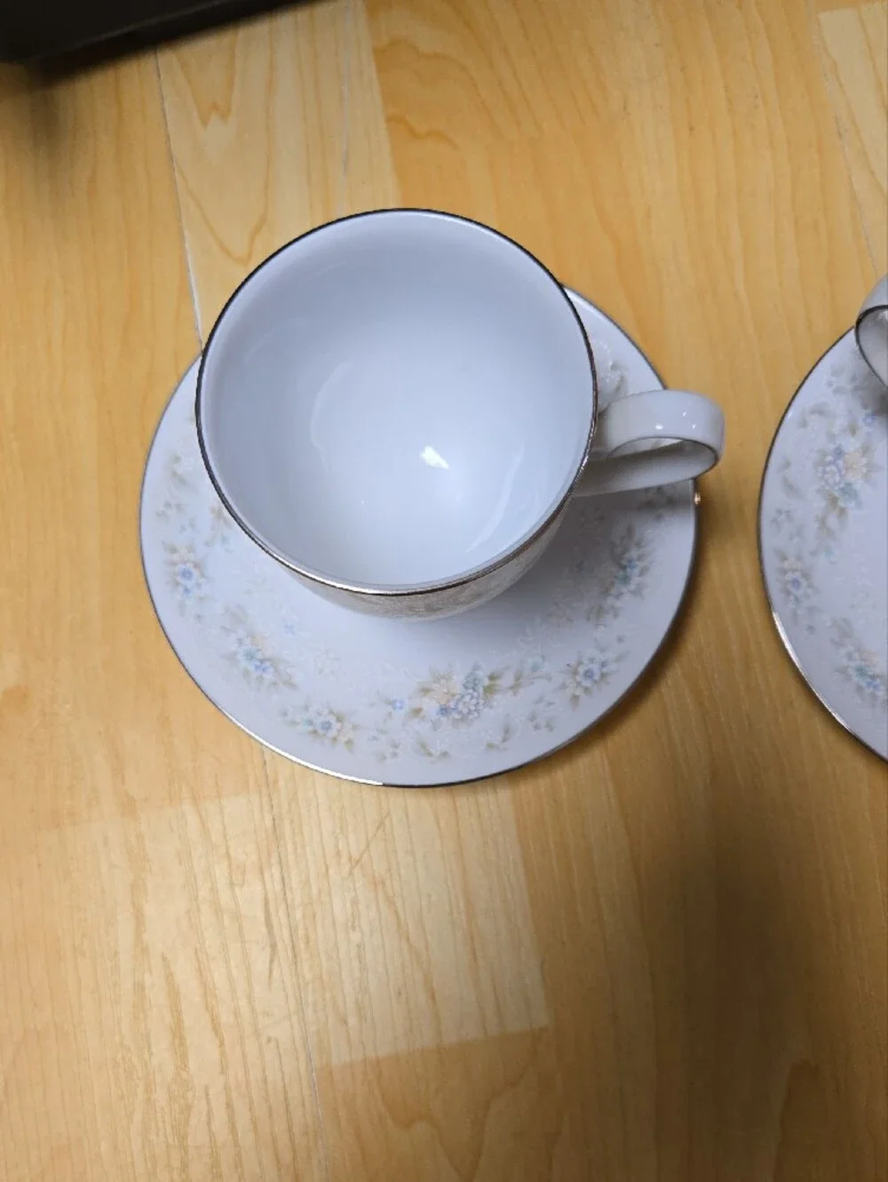 Elegant Noritake, White Floral Teacup and Saucer Set